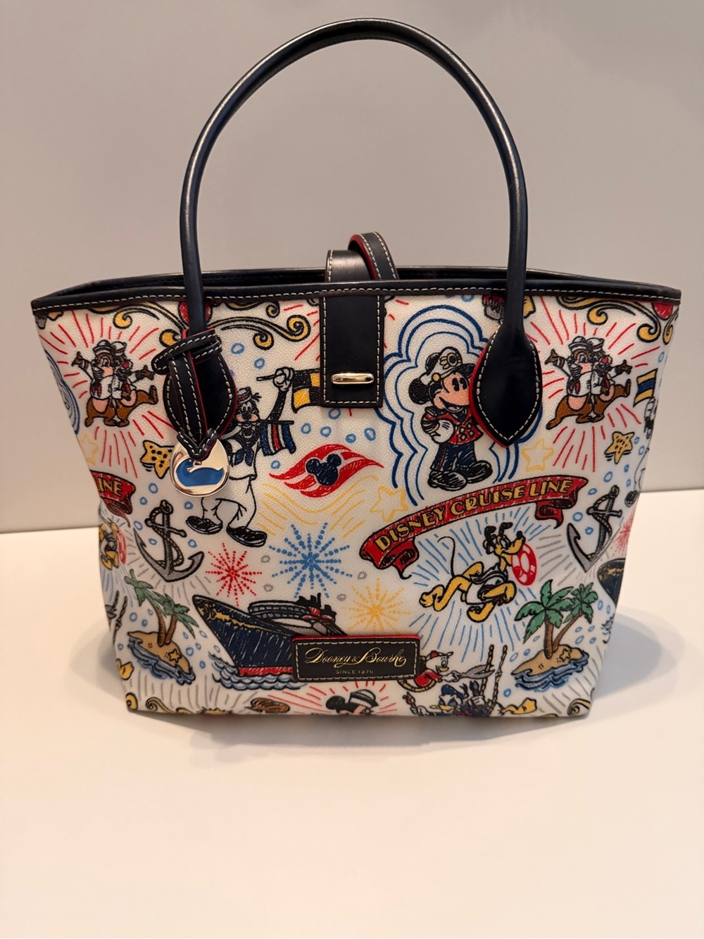 Disney Cruise Line Dooney& Boutke Sketch “Cindy” tote with red lining